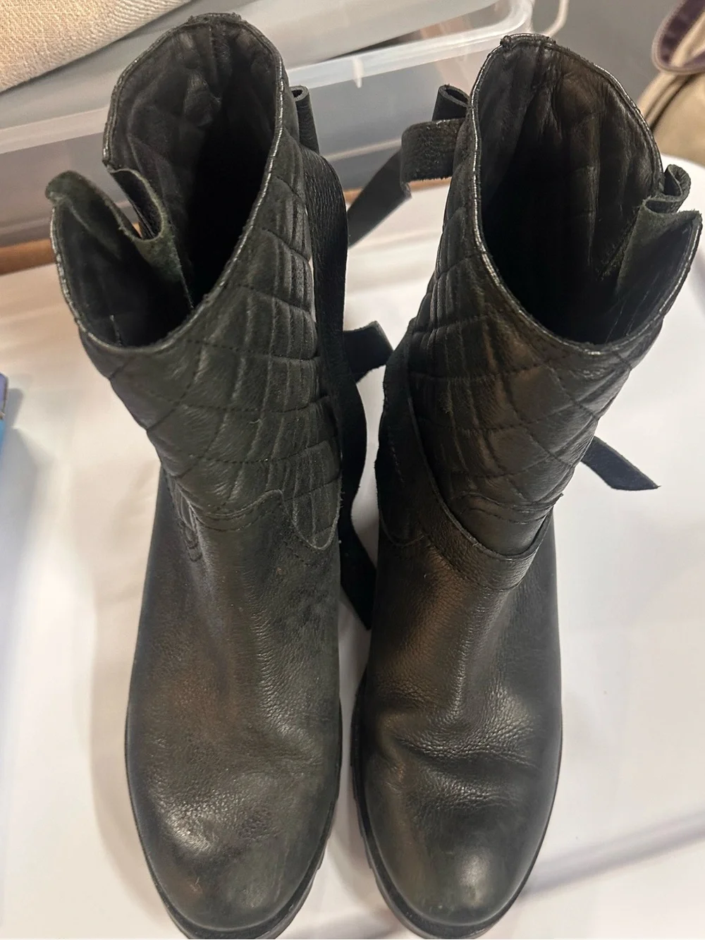 kate spade Black Quilted Leather Ankle Booties with Bow and Gold Spade Hardware